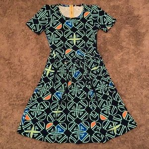 Patterned Dress with Pleated Skirt and Pockets